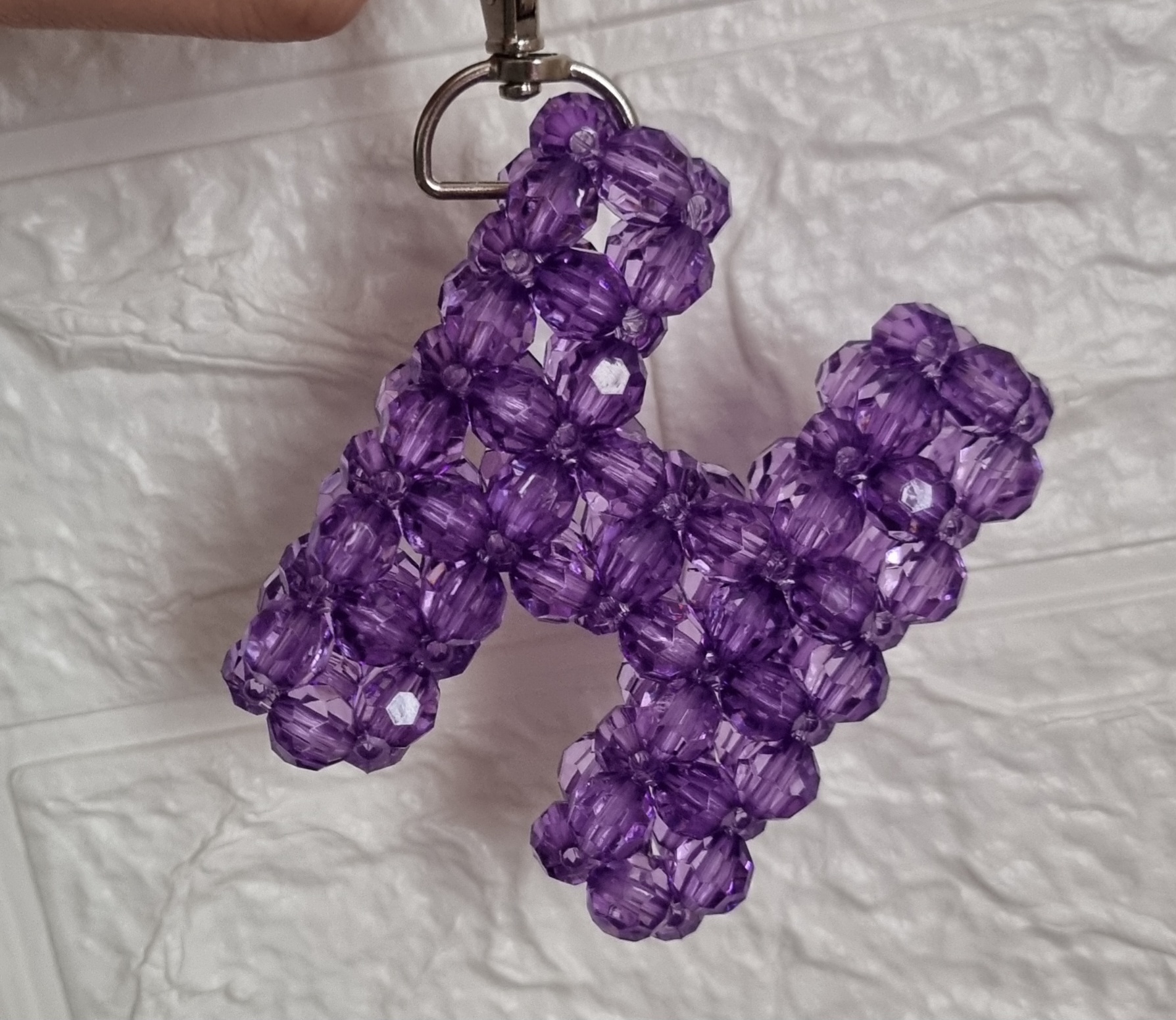 ميدالية H اللامع